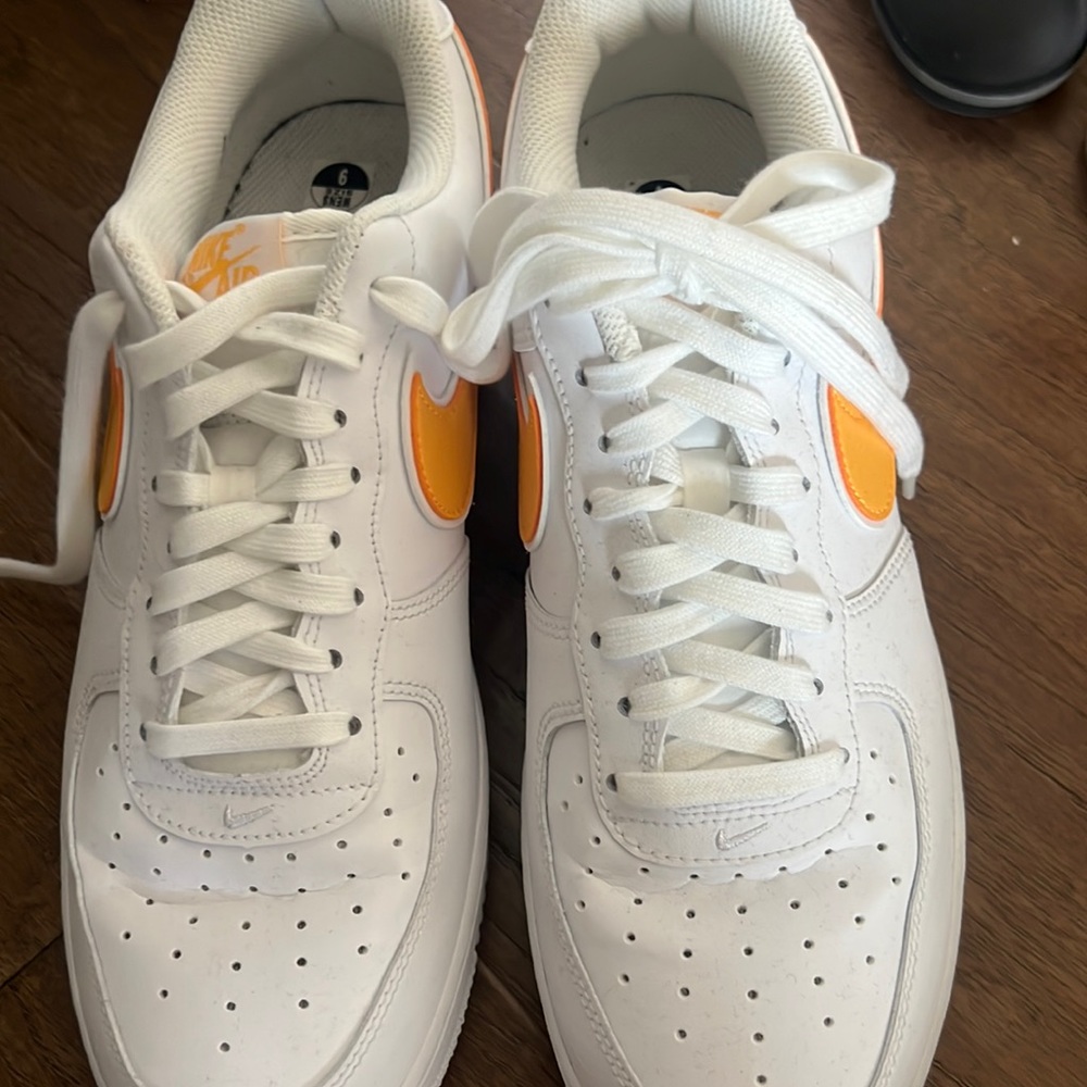 never worn before gold and white or yellow air force ones